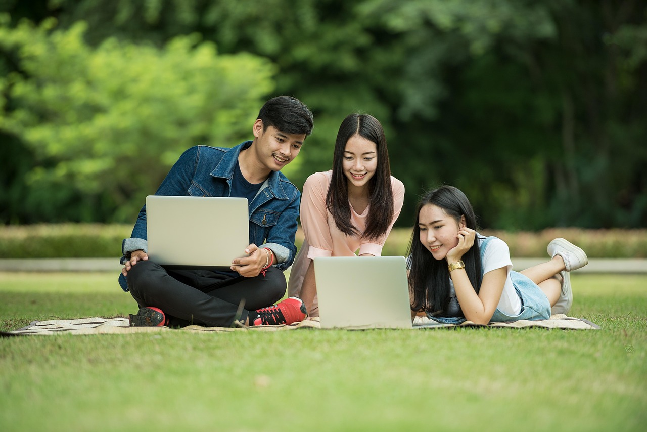 Students, computers, laptops — Dedicated Servers: Past Present Future